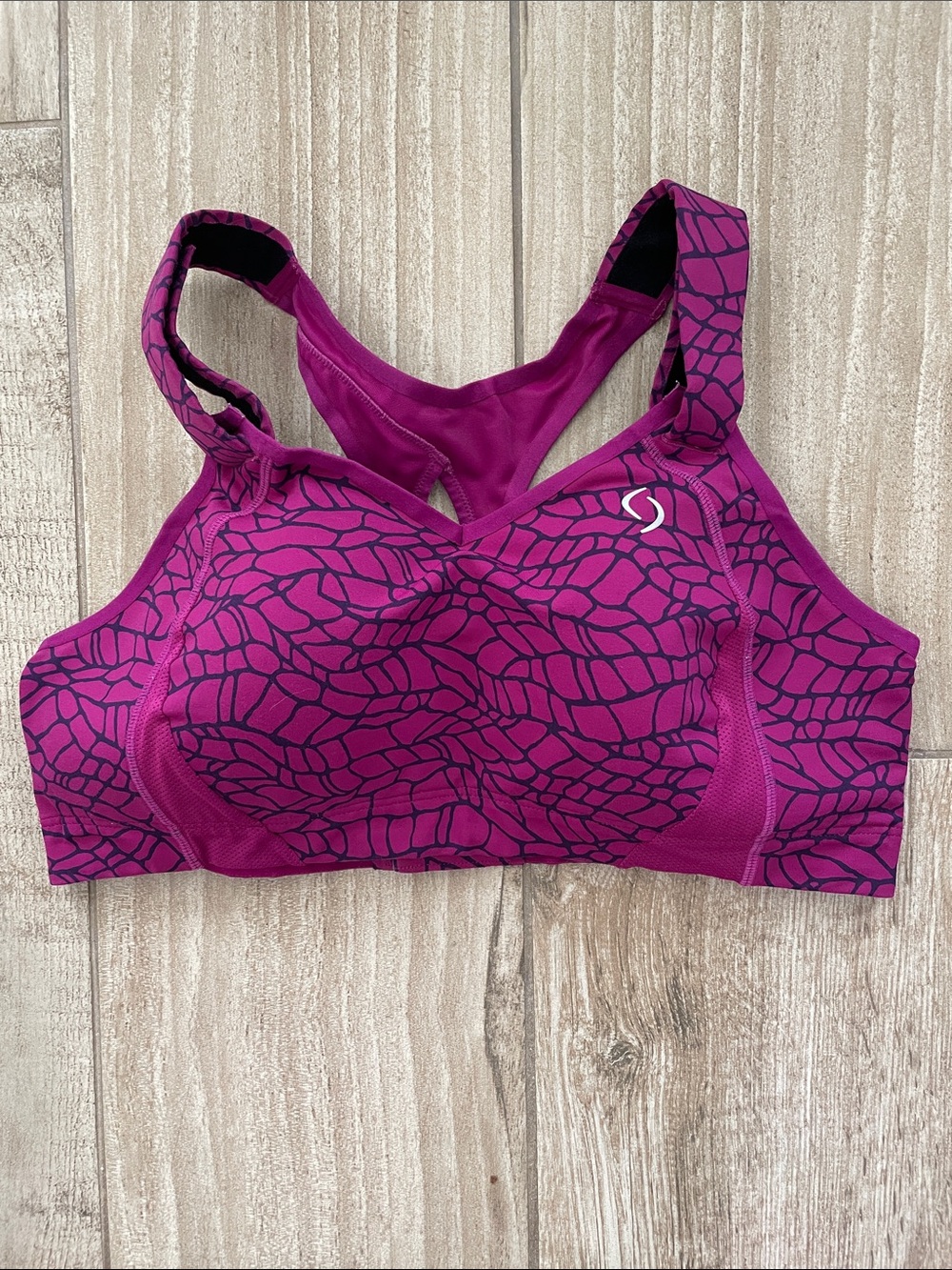 Moving Comfort dark pink and navy giraffe print sports bra, size 38C